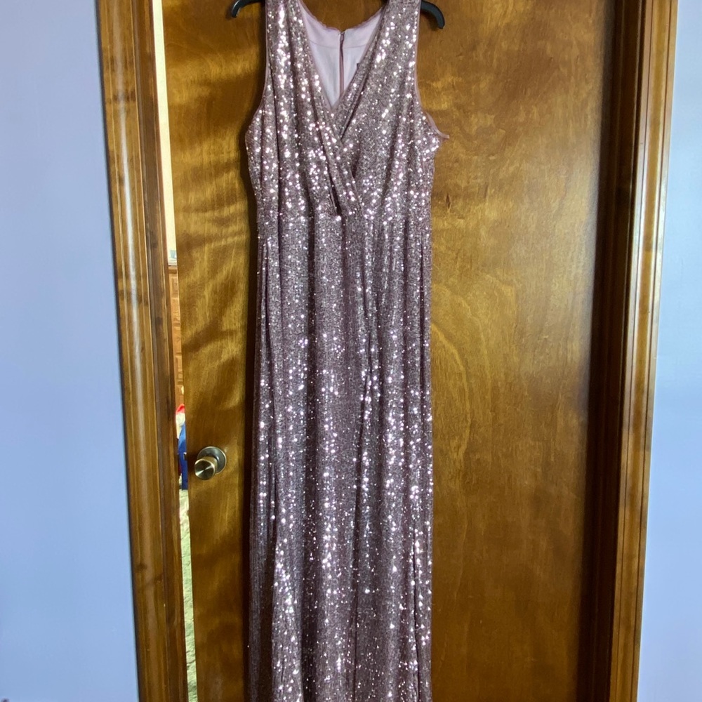 Floor length sequined gown.